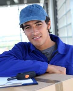 Deliver man in blue cap and overalls