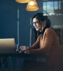 Young women working on laptoop