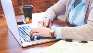 Man working on laptop at desk