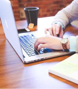 Man working on laptop at desk