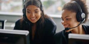 Two support team members answering a payroll enquiry