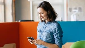 Woman reading phone message