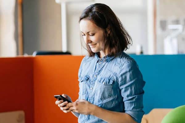 Woman reading phone message